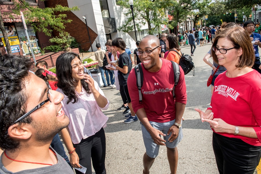 Image of students and Provost Weingart