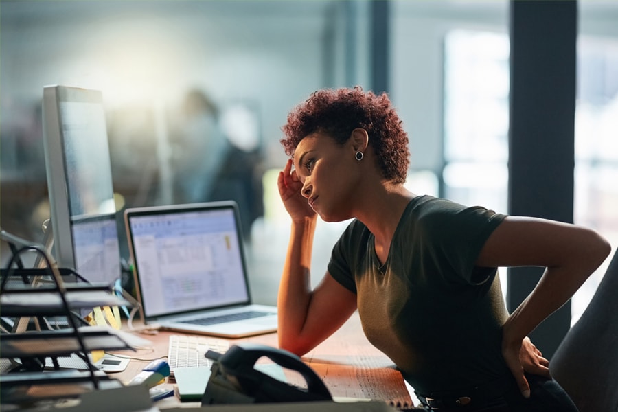 Image of woman looking at computer screen