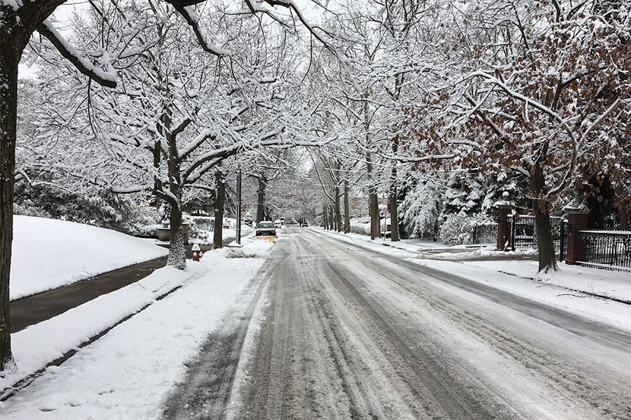Image shows a snowy street
