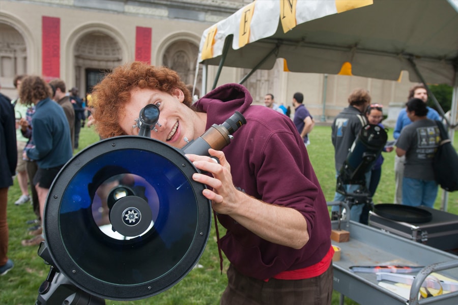 Archive image of a student looking through a telescope