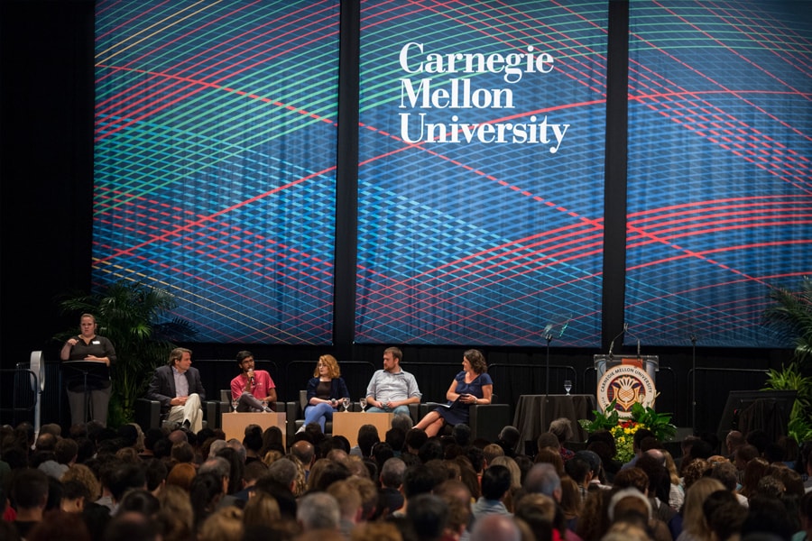 Image of speakers on stage