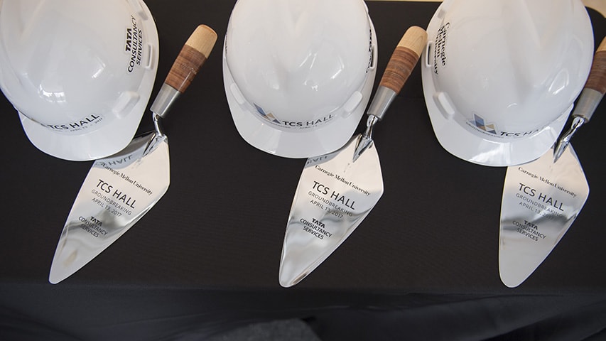 Image of trowels and hard hats