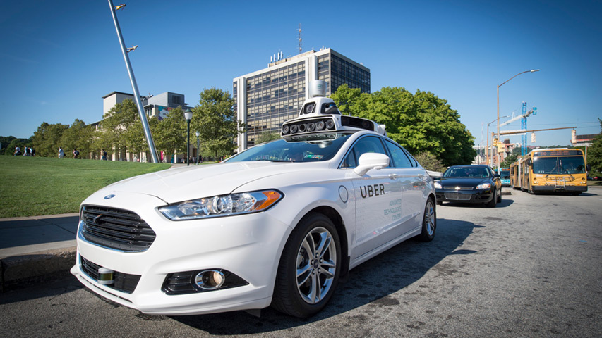 Uber pulling up to campus on Forbes Avenue