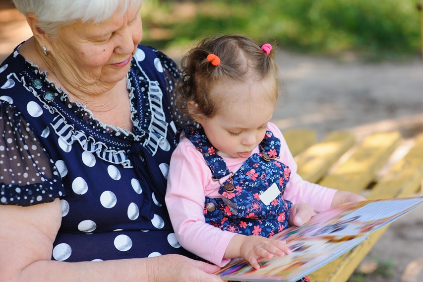 image of a grandmother and grandchild sitting together