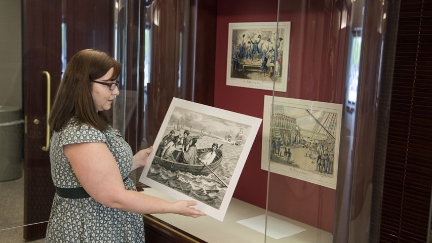 Juliann Reineke works on her exhibit