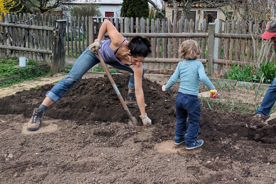 Image of Louisa Jáuregui working in a garden