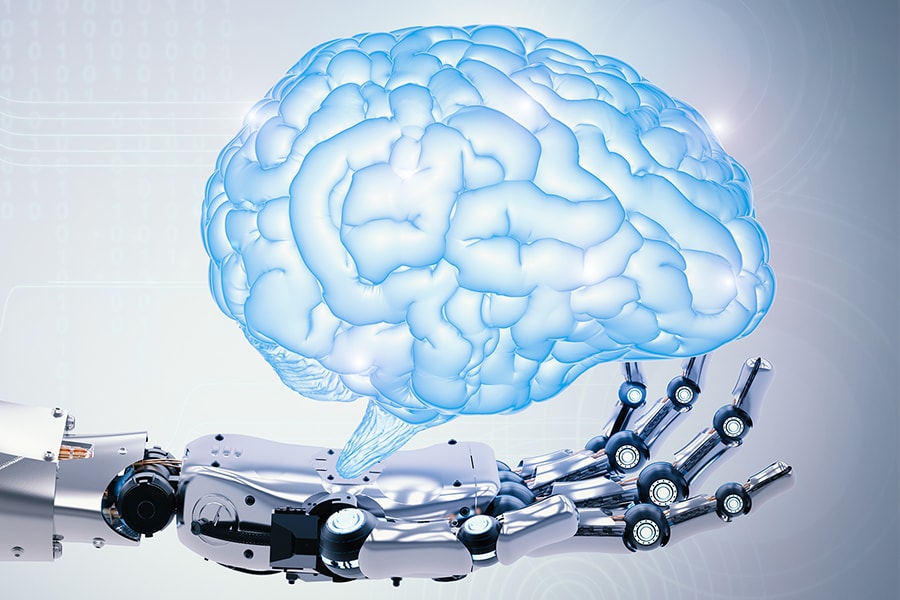 Image of robotic arm holding a brain