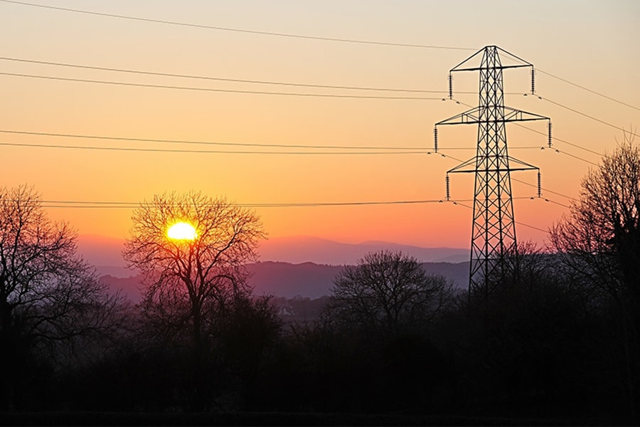 Image of sunset with power lines