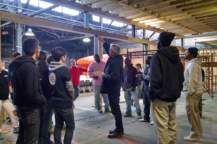 Image of students studying a framed room