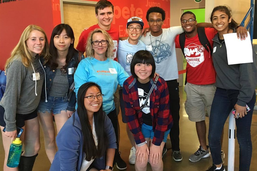 Image of Dean Doerge with MCS students at the Science Center