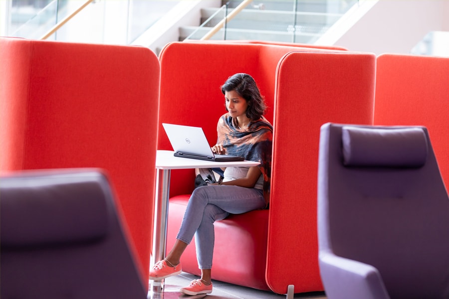 image of a student studying at the Tepper Quad