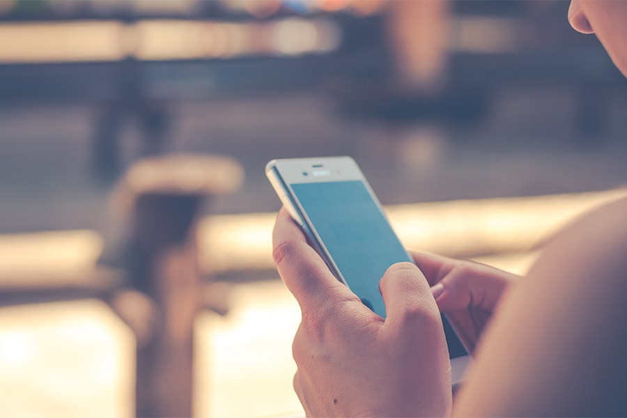 Image of hands with a smartphone