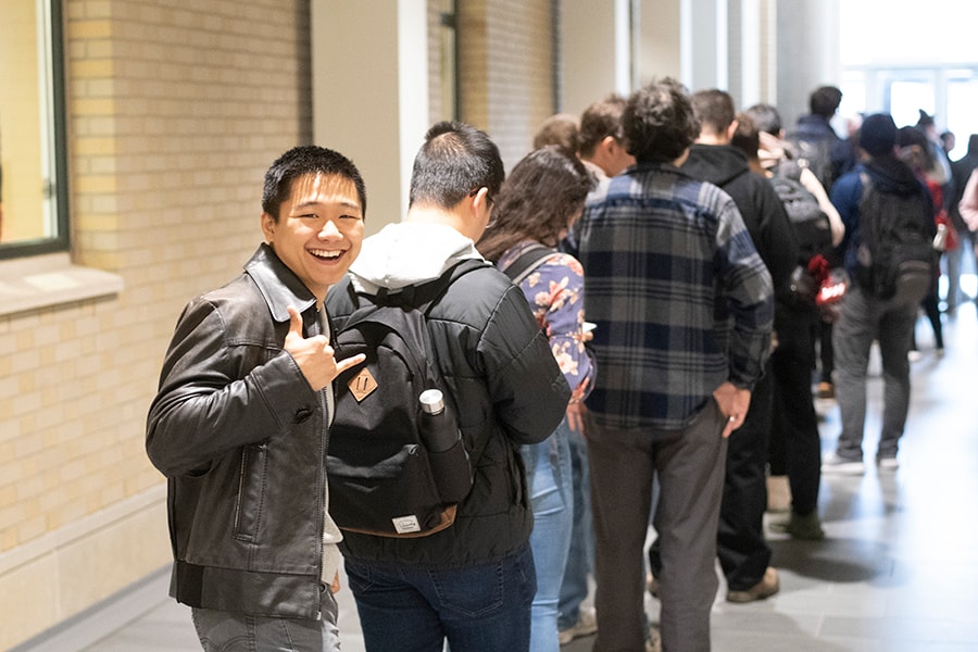 photo of student in line for breakfast during Farnam inauguration