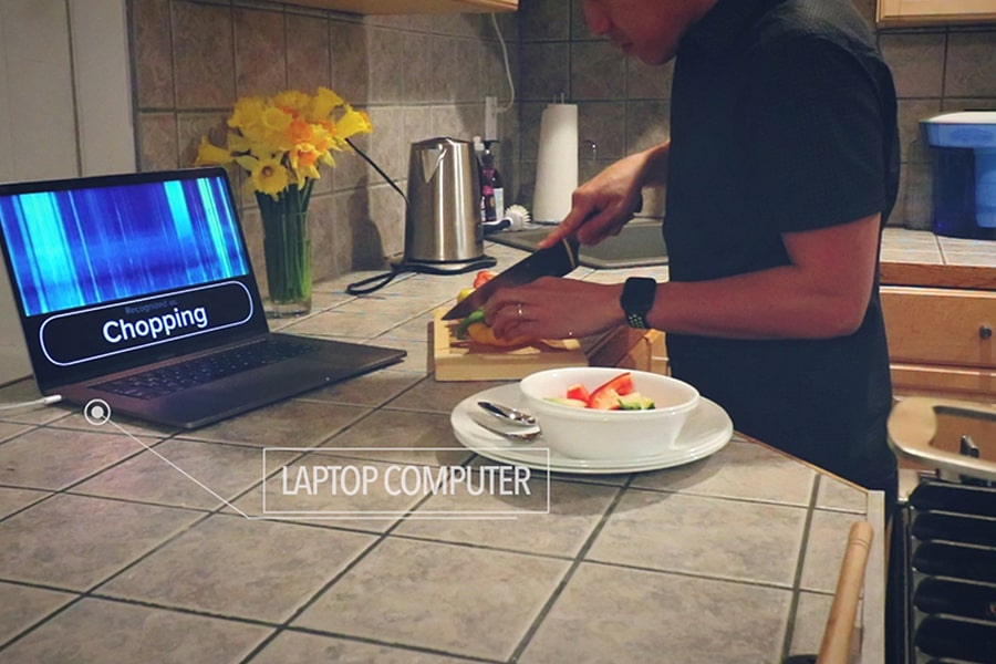 Image of person chopping in a kitchen