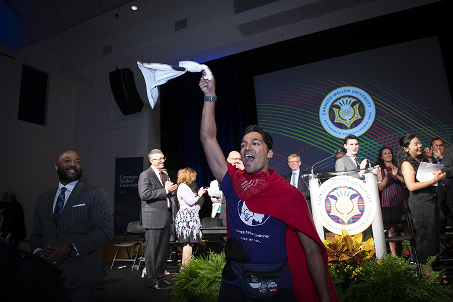 A student cheers at Convocation