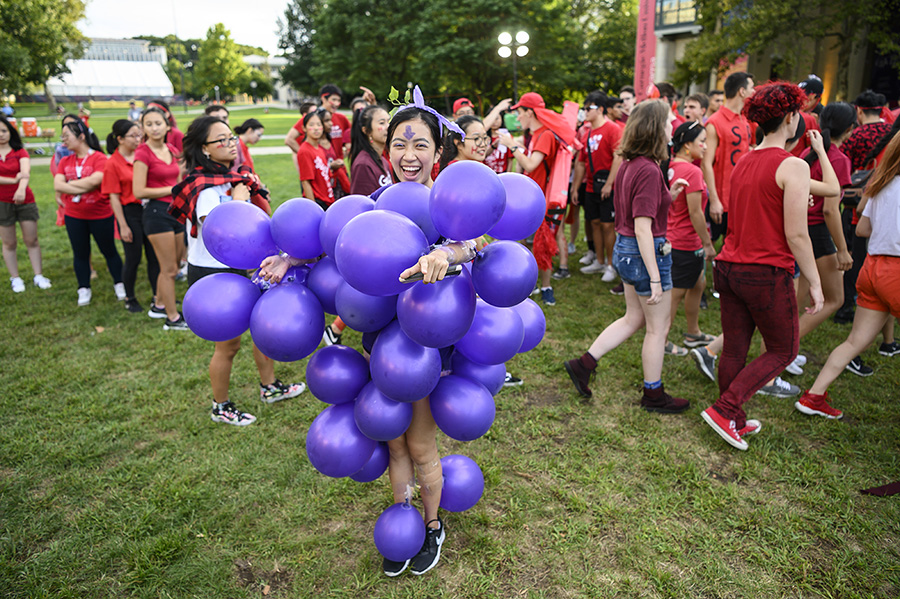 A photo of a student dressed up as a grapevine