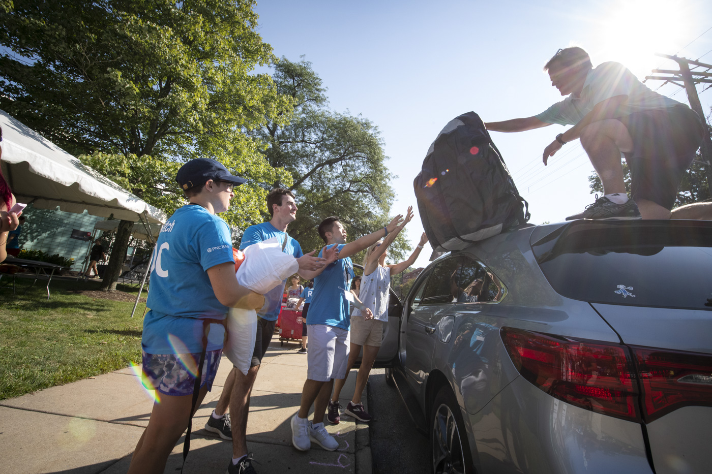 A photo of students moving onto CMU campus.