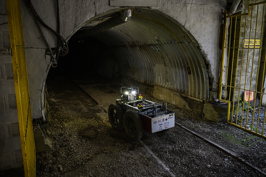 A photo of a robot entering a mine
