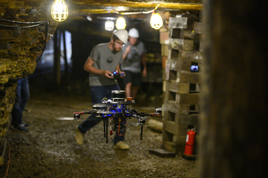 A photo of a drone exploring a mine