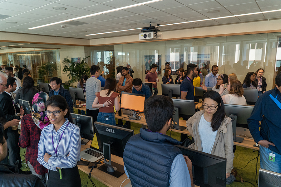 Interns demo their summer projects.