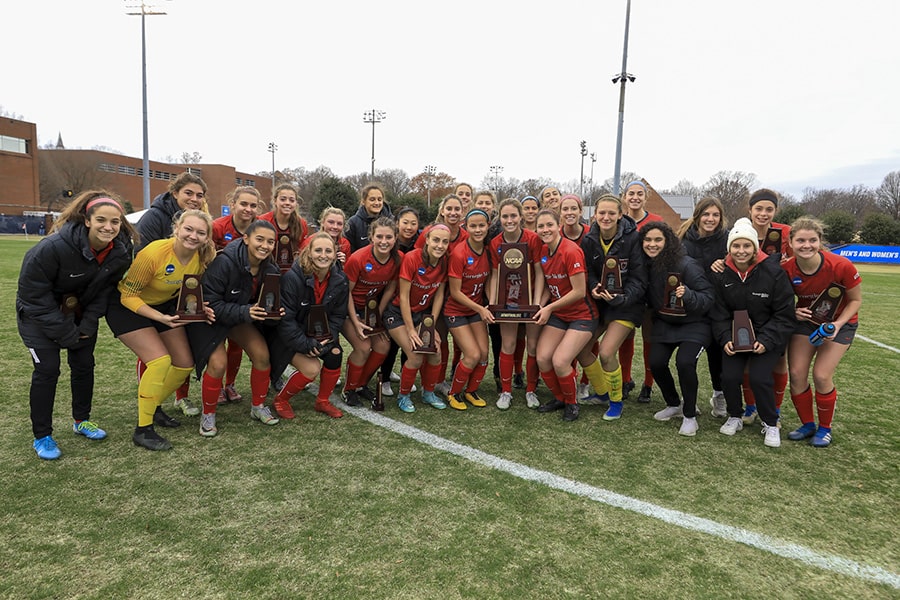 A photo of a trophy presentation