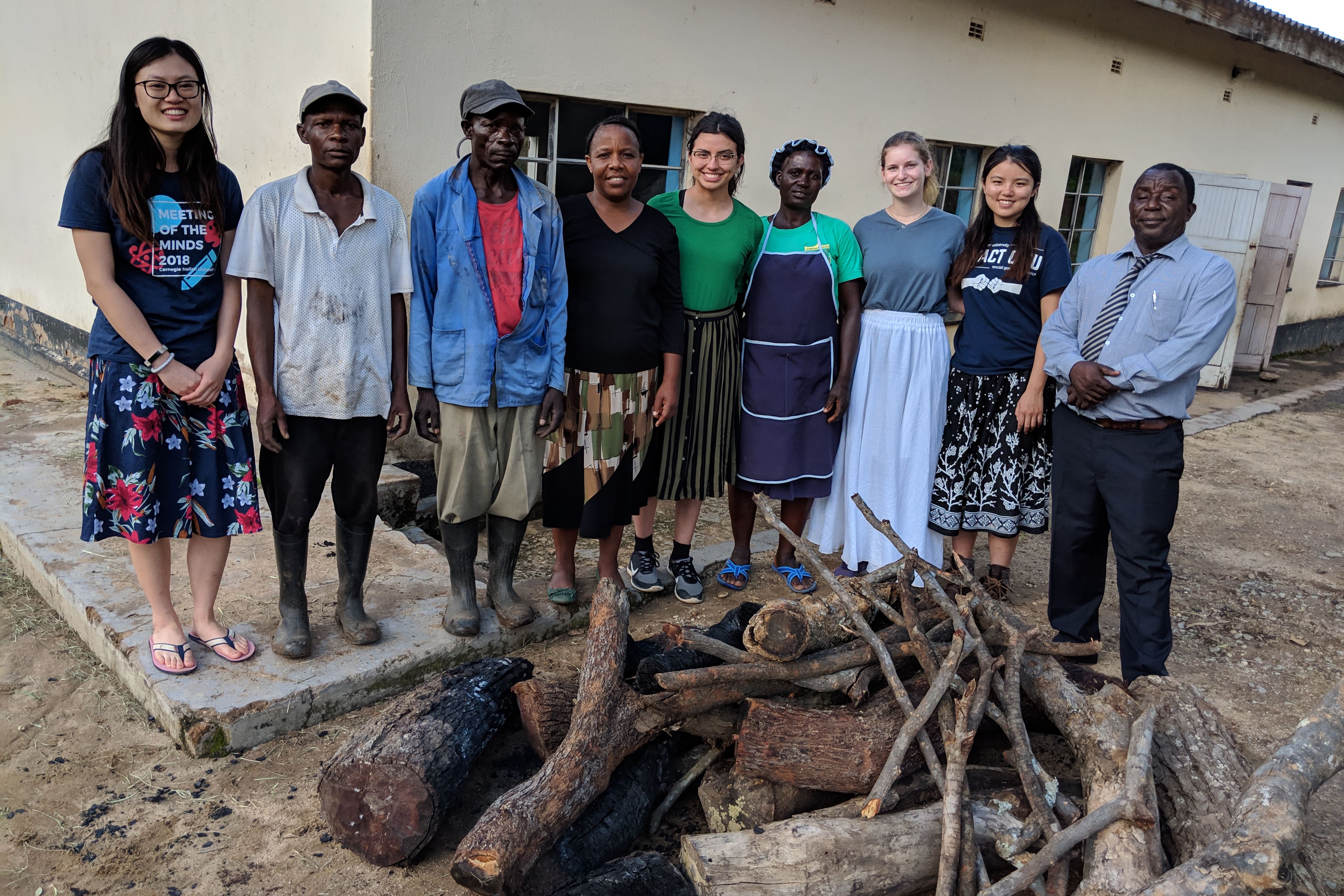 students with kitchen staff