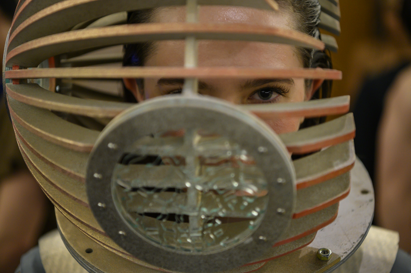 A student models a helmet.