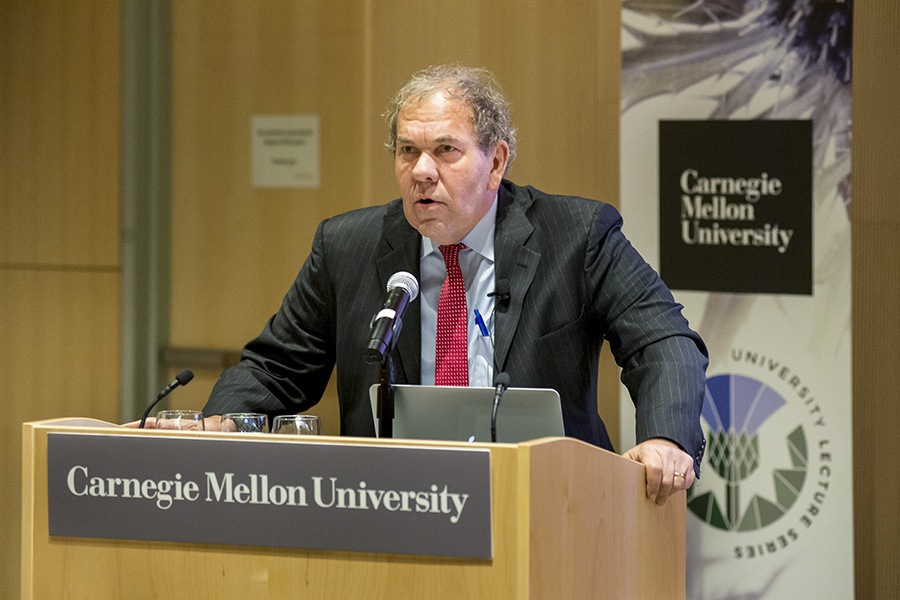 A photo of Arthur Levine speaking.