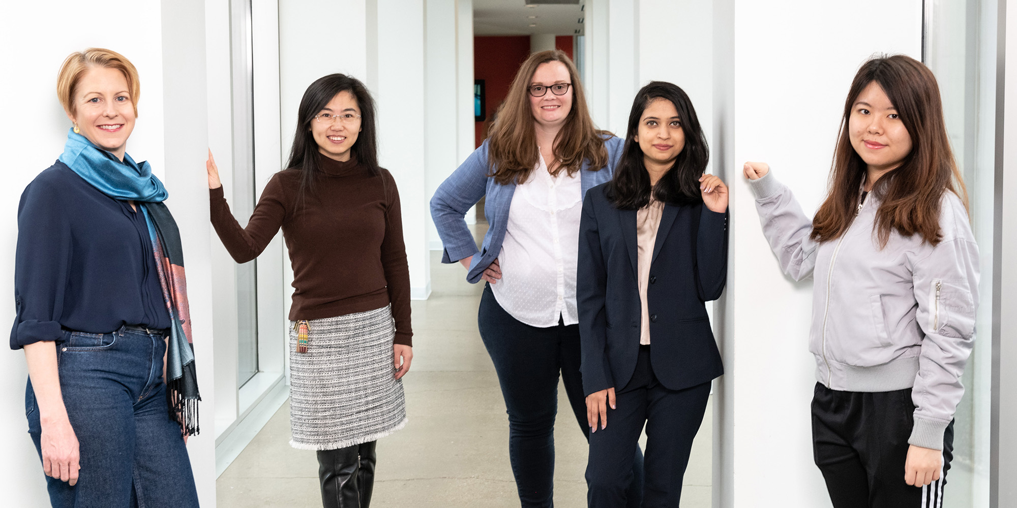 Women standing in a corridor