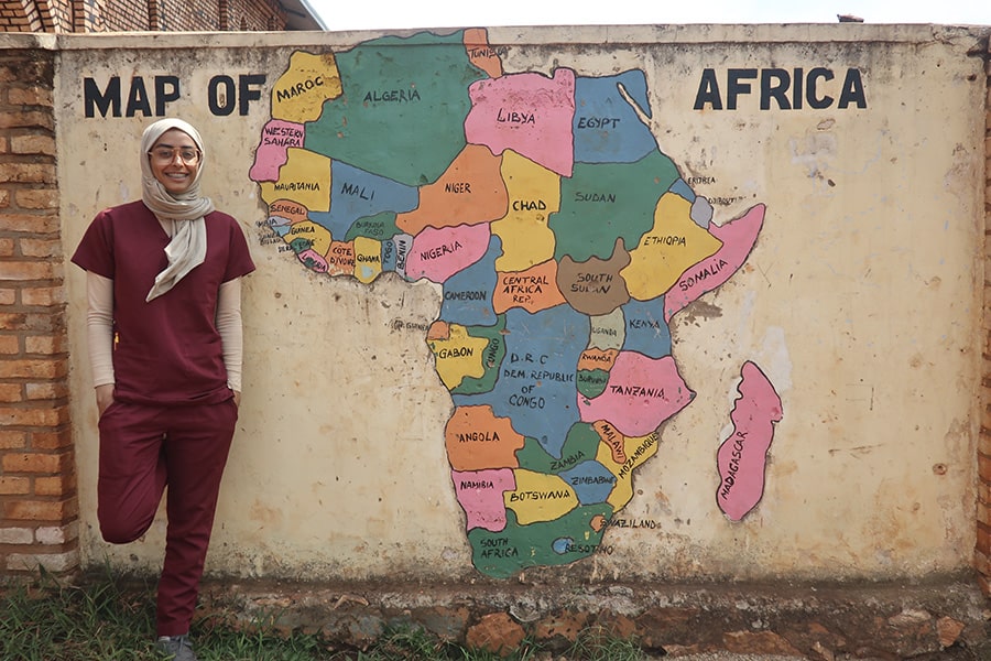 Al Ali in front of a map of Africa