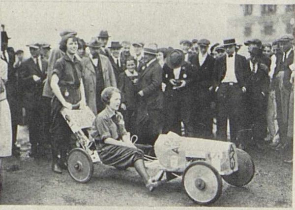 an old Buggy from 1922 with a woman driving