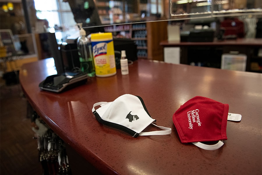 image of CMU-branded facial coverings on the counter at the University Store
