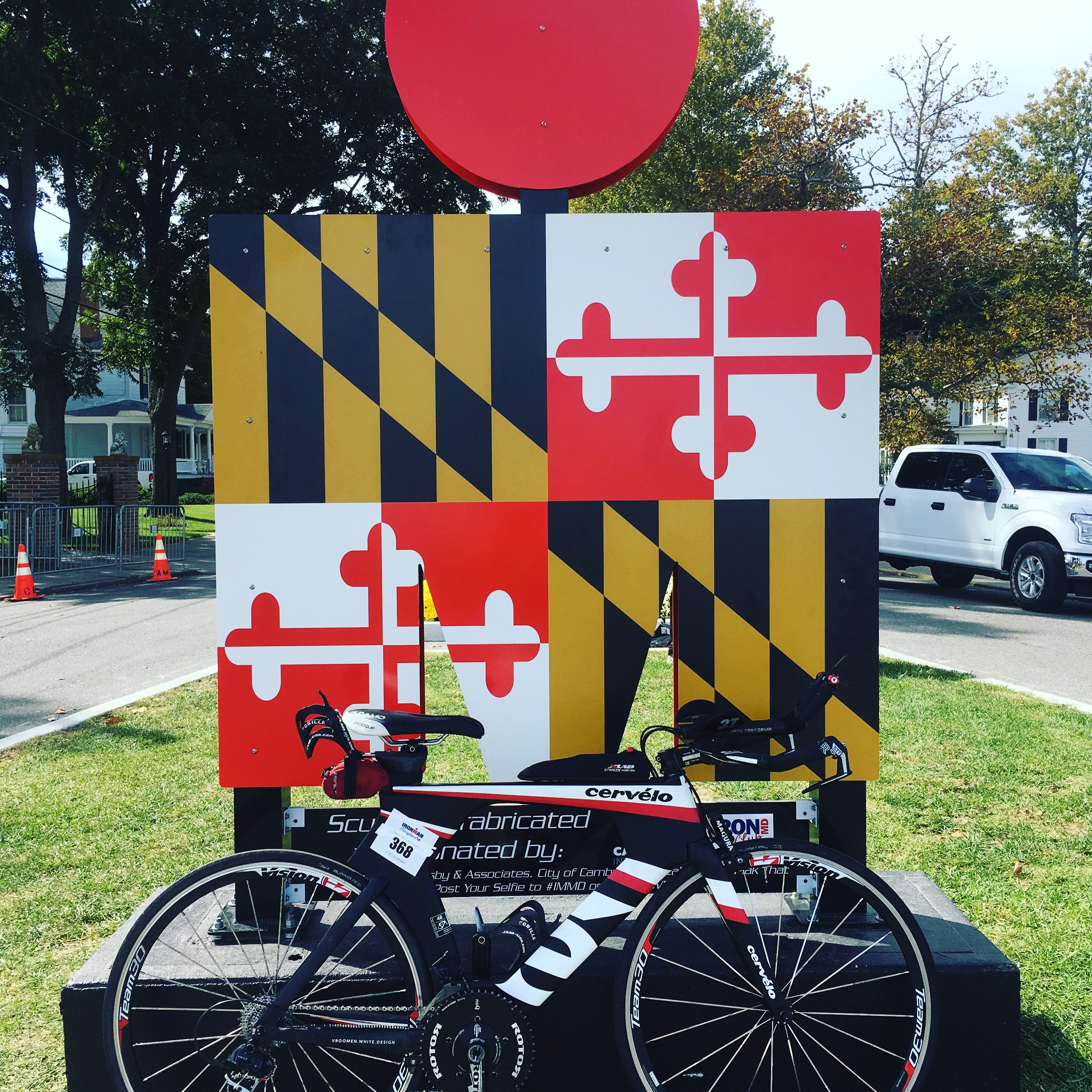 racing bicycle before a Maryland state flag