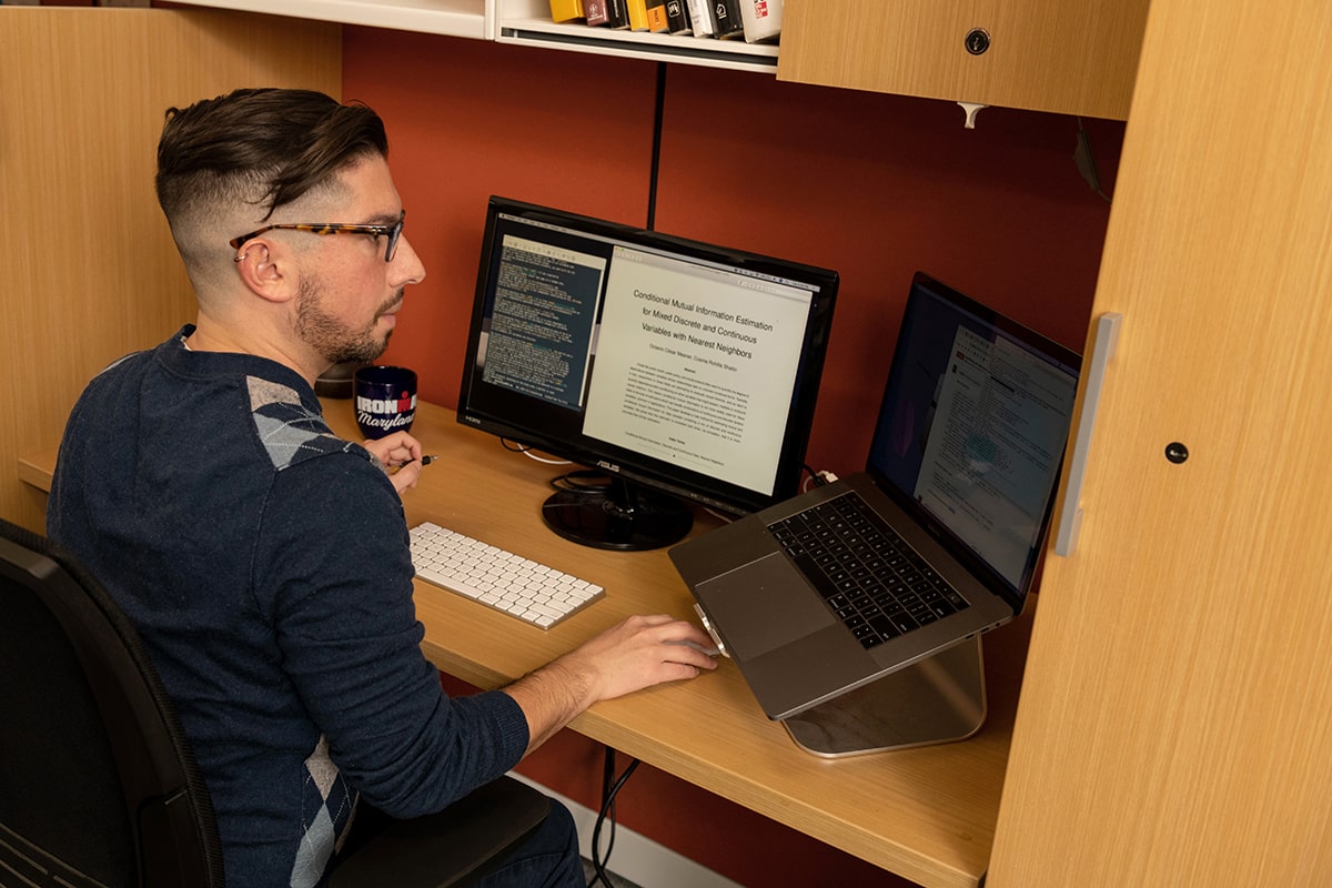 Octavio Mesner completes research at his computer