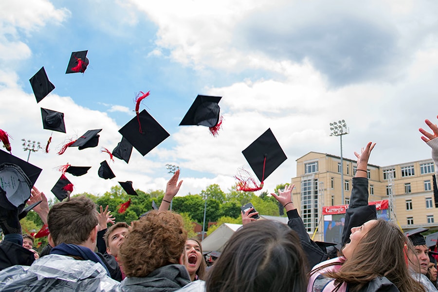 Image of mortar boards being tossedg\