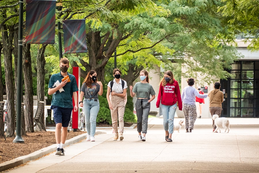 students walking on campus