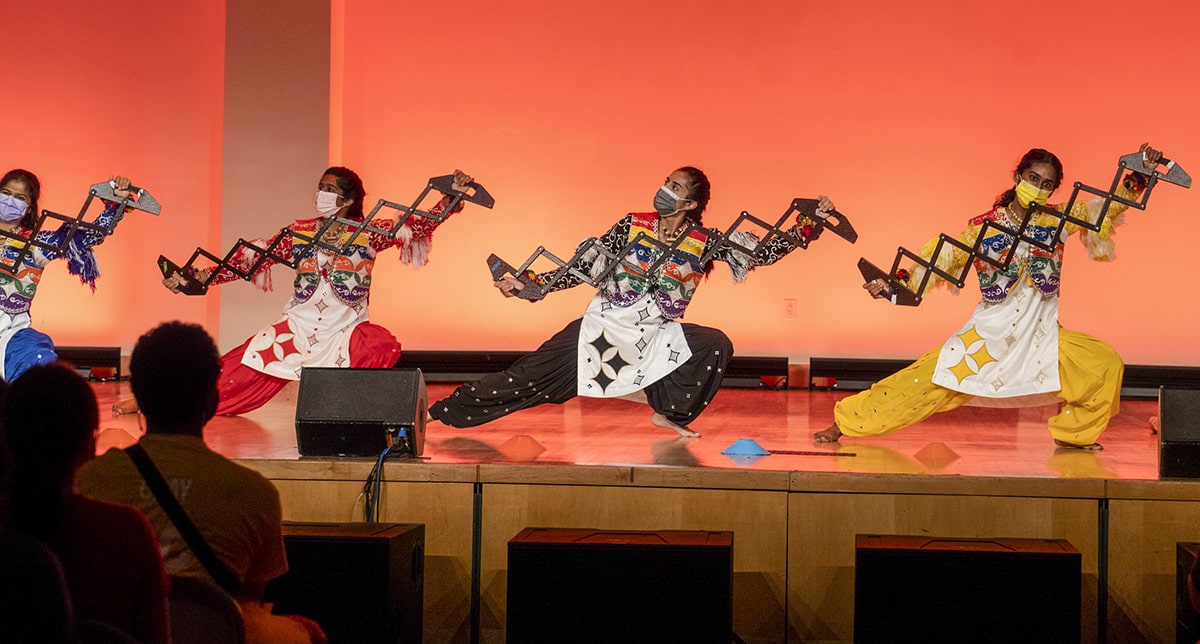 Students perform on stage