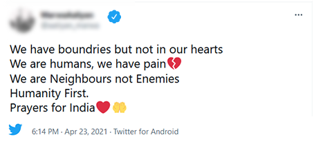 Screenshot of tweet that reads We have boundries but not in our hearts. We are humans, we have pain. We are neighbors not enemies. Humanities first. Prayers for India