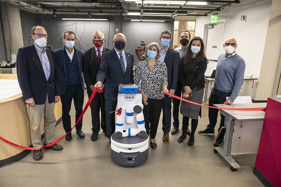 A group photo at the ribbon cutting