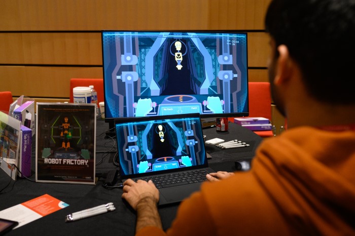An image of a brainplay conference attendee playing a computer game.