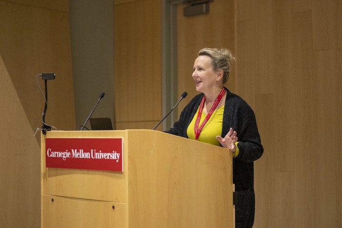 A picture of a brainplay conference speaker at the podium. 