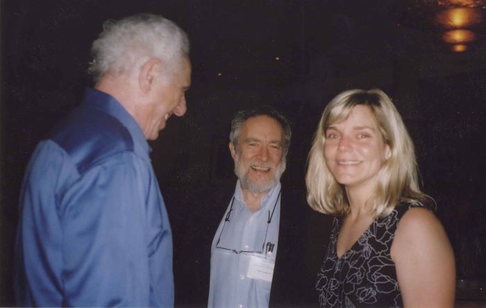 Shinn-Cunningham (right) with her mentor, Nat Durlach (left) and advisor H. Steven Colburn (center) at an ASA event in 2002.