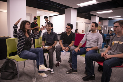 Students sitting together talking at the Center for Student Diversity and Inclusion open house