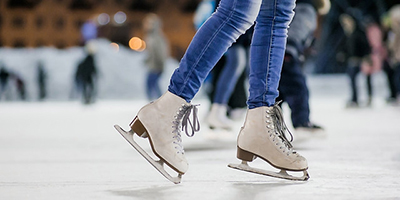 Image of figure skates on ice