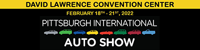 Black event banner, with graphics of cars and text David L Lawrence Convention Center, February 18 to 21 2022, Pittsburgh International Auto Show