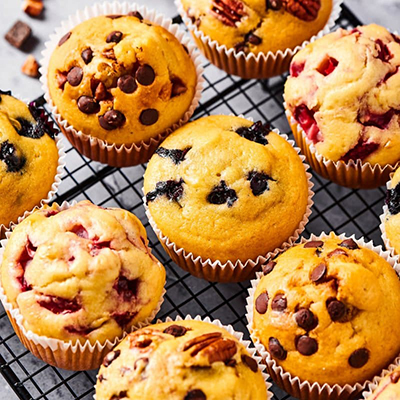 Picture of assorted muffins on a cooling rack