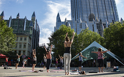 Picture of people doing yoga in Market Square