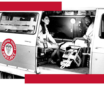 Black and white image of a Black female EMT from Freedom House Ambulance