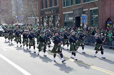 Image of bagpipers marching in the St. Patrick's Day parade