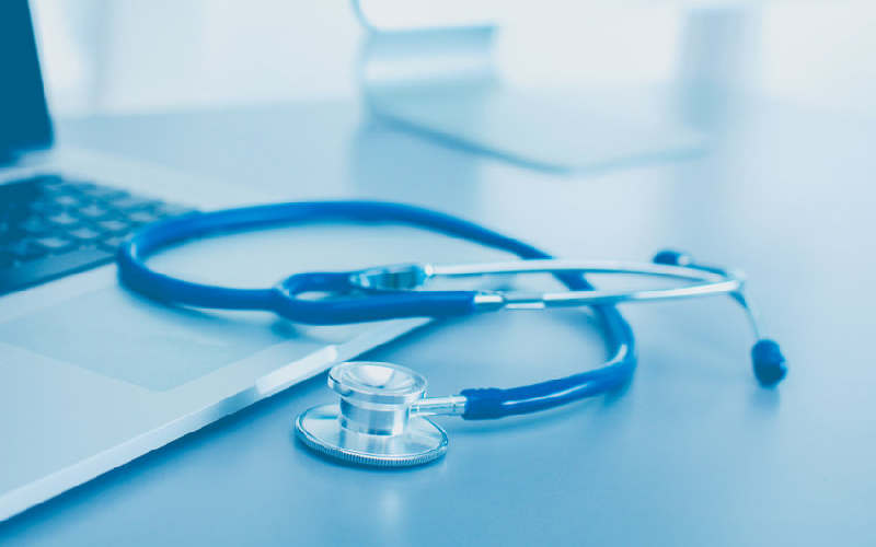 Stethoscope on table in blue color